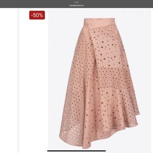 Pinko gonna ispica ampla in sangallo